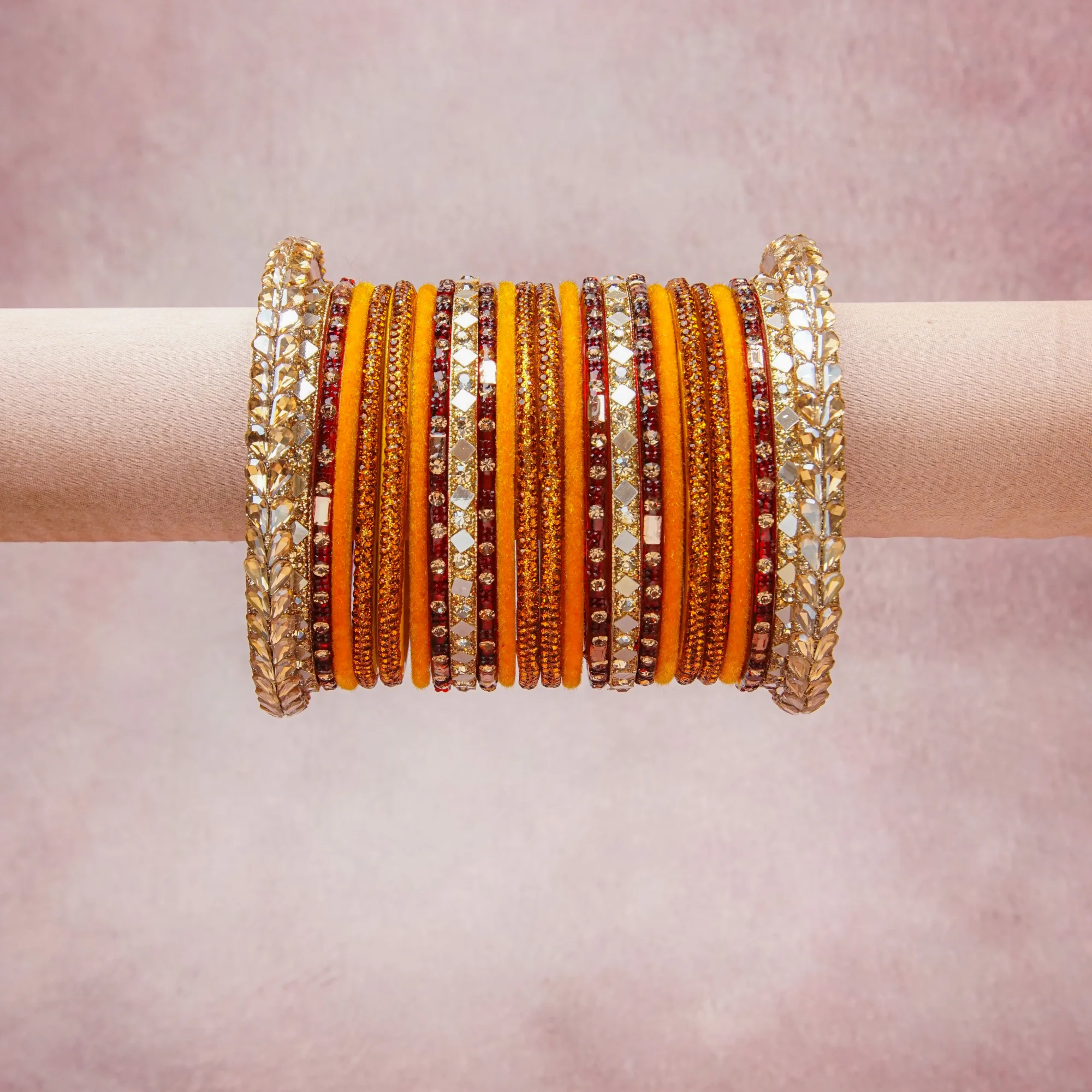 A grounding Marigold Yellow forms the heart of the set, while touches of Antique Gold, Scarlet Red add charm.

A thoughtful composition of Velvet, Gold-plated Metal, Mirror, Rhinestone, Glass, designed to feel complete without being heavy.
Each element layers seamlessly, creating a look that is refined, wearable and quietly striking.